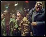 DJ Iz (De'Angelo Wilson), Chedder Bob (Evan Jones) and Sol (Omar Benson Miller) go crazy as Jimmy's freestyle rap decimates the competition at The Shelter club in "8 Mile"