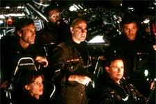 Clockwise from lower left: Hilary Swank, Aaron Eckhart, Delroy Lindo, Stanley Tucci, Tcheky Karyo and Bruce Greenwood in Paramount's The Core - 2003 