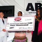 GMC Faith and Family Screenplay winner Nzinga Kadalie Kemp with award check GMC Faith and Family Screenplay winner Nzinga Kadalie Kemp with award check