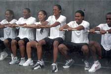 Devon (Nick Cannon, center), Diedre (Candace Carey) and the rest of the show-style marking band drumline endure the rigors of training.