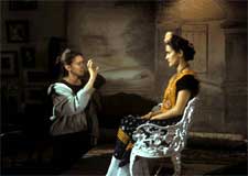 Director Julie Taymor and Salma Hayek behind the scenes of FRIDA.